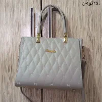 لباس و کیف|لباس|آستانه اشرفیه, |دیوار