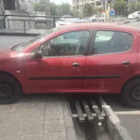 پژو ۲۰۶ آلبالویی بدون رنگ