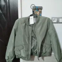 کاپیشان خلبانی المانی|لباس|شیراز, شهرک کوشکک|دیوار