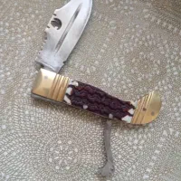 چاقو گوزن دسته دنده ای