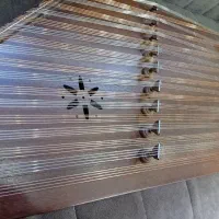 سنتور نو به همراه کیف و کتاب و میز