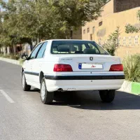 پژو پارس ۱۳۹۱ سفید توکرم کمکار