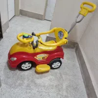 ماشین  و  عروسک  بزرگ  یکجا