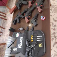 لباس پلیس همراه با تفگ و تیر