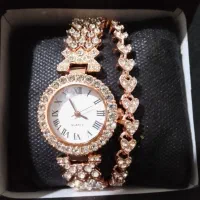 ساعت به همراه دستبند.