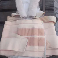 کمربند طبی و قوز بند.دوتا سینی سرب