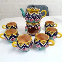 قوری ، وارمر و یک عدد فنجان