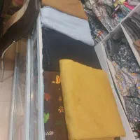 چند تاقه پارچه فروشی