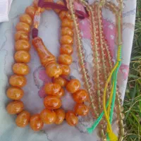 تسبیح سندلوس۱۰۳وتسبیح کهربابهترین زنگ|کلکسیون اشیاء عتیقه|کرمانشاه, |دیوار