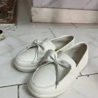 کفش زنانه|کیف، کفش، کمربند|رشت, فلسطین|دیوار