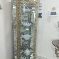 بوفه و ساعت ایستاده وچهار تیکه ست پذیرایی برنز