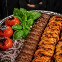 انواع غذا کباب ساندویچ150ت با لیموترش گوجه ریحون
