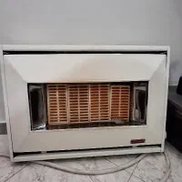 بخاری دیواری آبشال کاملا سالم