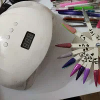 وسایل کاشت ناخن و میز ناخن