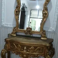 آینه کنسول جنس رزین طلایی رنگ