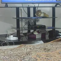 فروش یک عدد میز تلویزیون شیشه ای