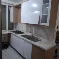 نصب روکش نصب برچسب کابینت و کاشی با سشوار صنعتی