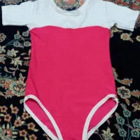 لباس ژیمناستیک یا مایو دخترانه|لباس|قم, قلعه یزدیها|دیوار