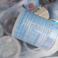 قوطی خالی با درب و قاشق