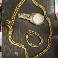 یک ست گردنبند با دست بند . یک ساعت سالم