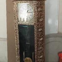 ساعت ایستاده طلایی