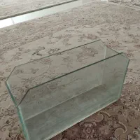 آکواریوم به همراه شن کف آکواریوم