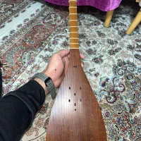 ساز تنبور کاسه ایی|سازهای سنتی|قدس, شهر‌قدس|دیوار