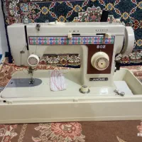 چرخ خیاطی.