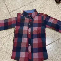 تعدادی شلوار لی و بلوز مردانه به دلیل تغییر شغل