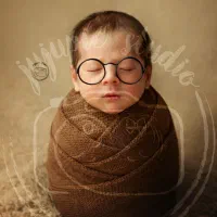عکاسی تخصصی نوزاد (به همراه یک عکس هدیه )