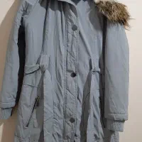 کاپشن|لباس|آفتاب, |دیوار