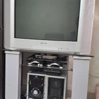 تلوزیون ومیز تلوزیون نقره ای