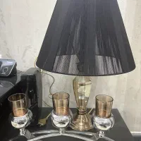 یک عدد آباژور و یک عدد جا شمعی رو میزی