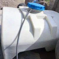 تانکر پلاستیکی سفید 2000پشت نیسانی و تانکر فلزی