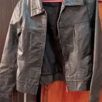 تعدادی لباس نو و در حد نو حراج شده