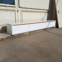 میز تی وی جنس هایگلاس سفید براق و دستگیره مخفی