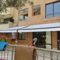 سایبان بازویی متحرک برقی و دستی