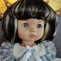 عروسک پیراهن گل گلی