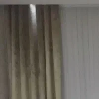 فروش دستک دوطرف  پرده در حد نو جنس ترک ومخمل طلایی