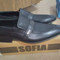 کفش آکبند و نوو|کیف، کفش، کمربند|مهاجران, |دیوار