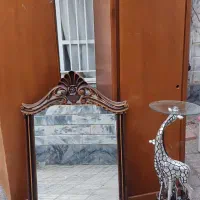 کمد،اینه،تخت،کیسه خواب،مجسمه