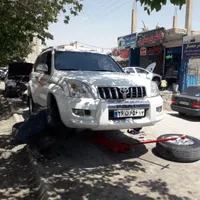 تعمیر گاه و جلوبندی|خدمات موتور و ماشین|اصفهان, رزمندگان|دیوار