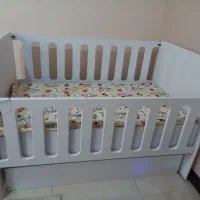 تخت نی نی لای لای  نوزاد