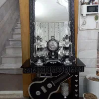 آینه شمعدان و ساعت