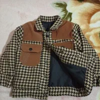 کاپشن|کفش و لباس بچه|خاوه, |دیوار