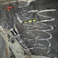 یک جفت فنر و یک عدد کمک پژو|قطعات یدکی و لوازم جانبی|پرند, فاز ۴|دیوار