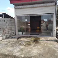 مغازه بالکن دار بر جاده اصلی سنگر