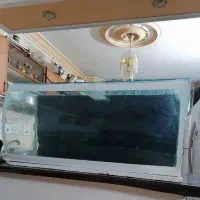 آکواریوم بزرگ شیشه منحنی با لوازم