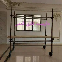 داربست.چهارپایه چرخدار.نما.تابلو.تخته بشکه