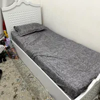 تخت خواب و کمد